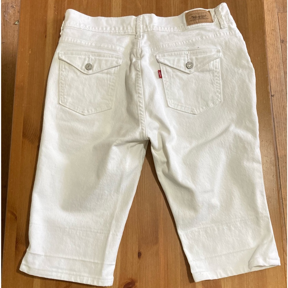 Levi's® 515 Mid–rise 12" inseam vanilla white denim jean knee shorts size 10